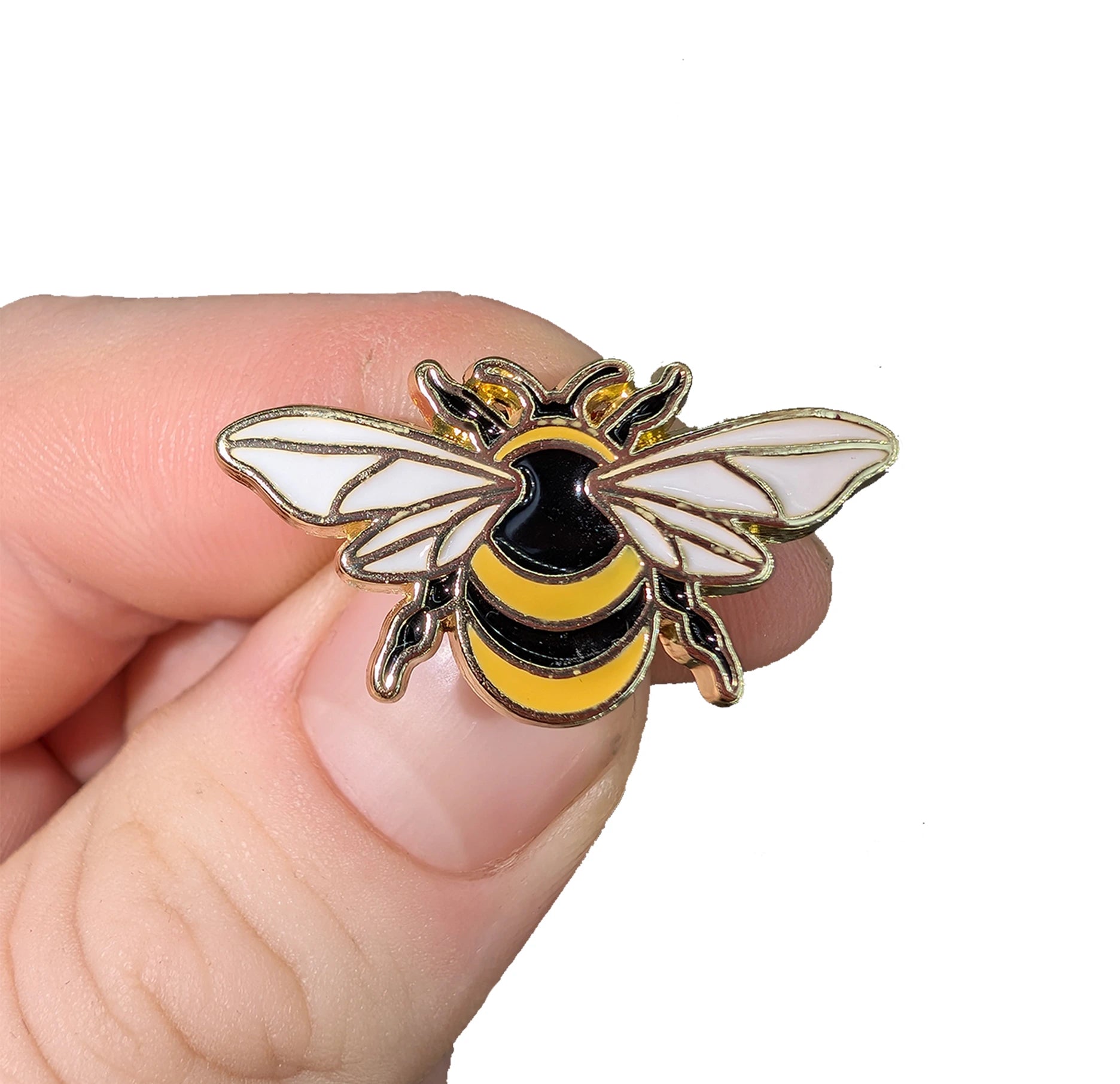 A close up of the bee pin badge.